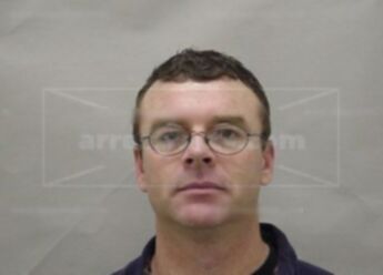 Timothy L Arnott