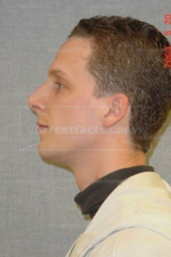 Travis J Beckman
