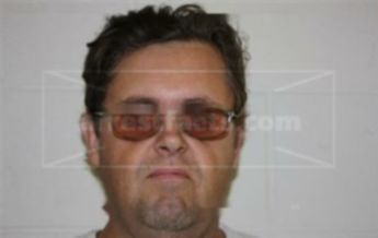 Travis John Oakley