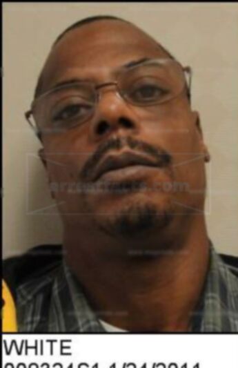 Gregory A White
