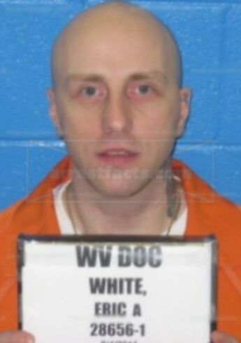 Eric A White