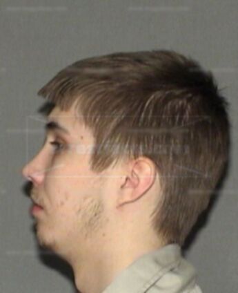 Travis Lee Simon