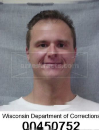 Travis J Mier