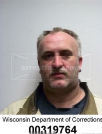 Eric C Micolichek