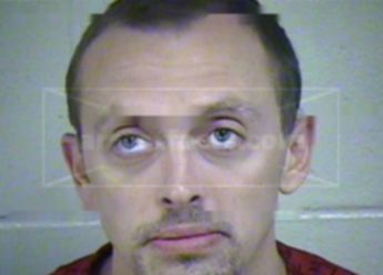 Christopher M Woods